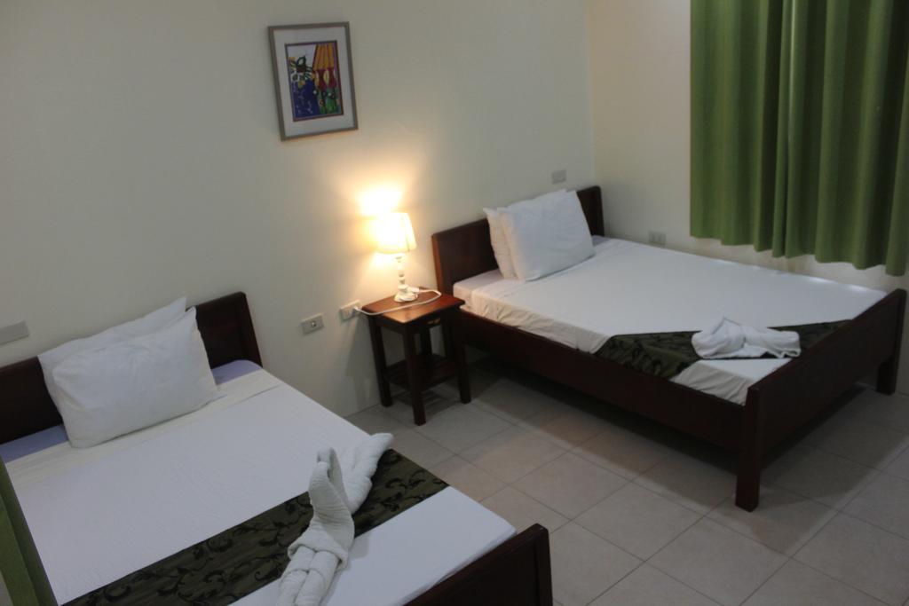 Blue Lagoon Inn & Suites Пуэрто-Принцеса Экстерьер фото