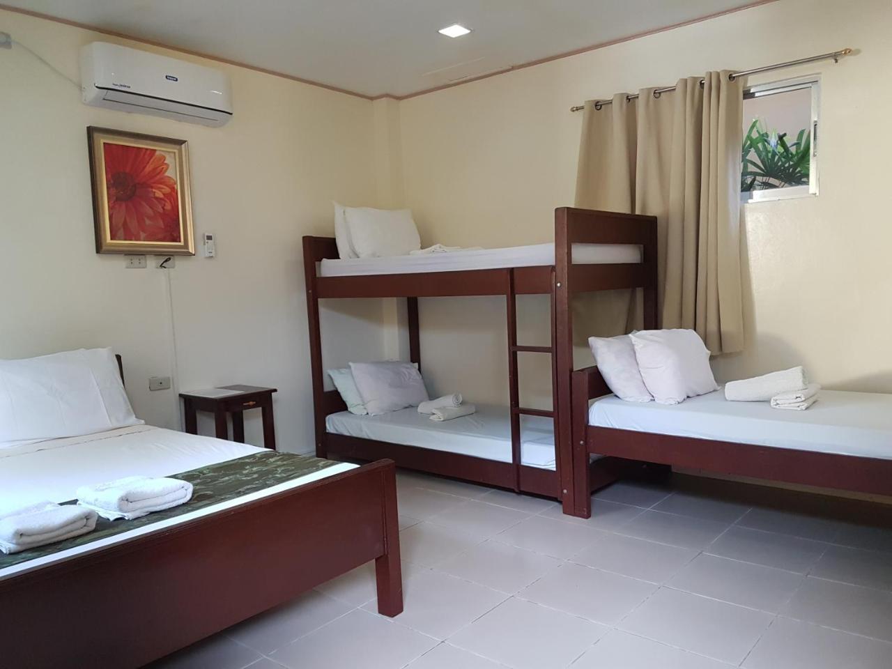 Blue Lagoon Inn & Suites Пуэрто-Принцеса Экстерьер фото